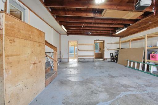 The garage is bigger than you think! Yes, you can fit 2 cars in here!