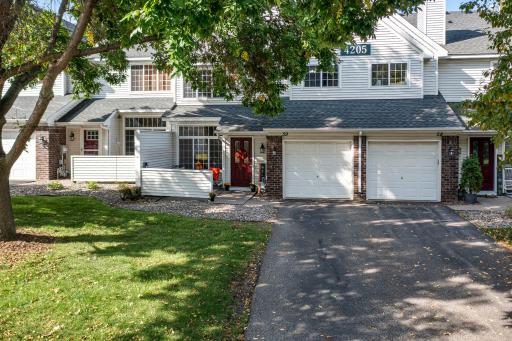 4205 Merrimac Lane N. #59 - Built in 1996, this 2-story beauty will steal your heart.
