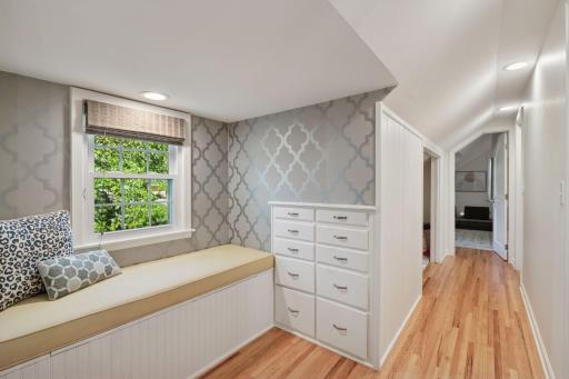 Fun reading nook and extra storage in the upper level hallway