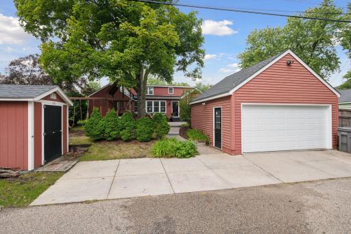 2 car garage with large concrete driveway