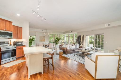 Wide open main level condo that walks out to a patio and the wooded back yard to extend your living spaces out.