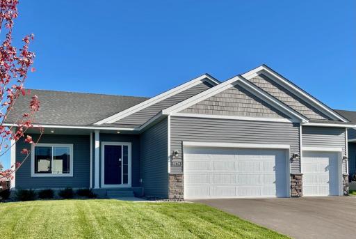 9770 32nd St NE- Completed New Construction Home ready for Quick Move-in! Highlights include a Finished Walkout Lower Level & Spacious Concrete Front Porch.