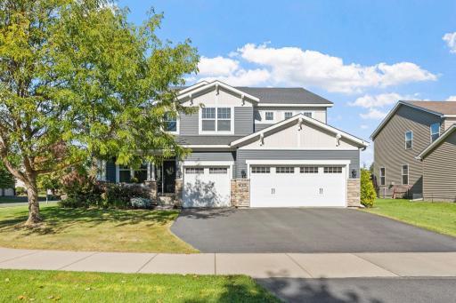A timeless two-story residence offering sophistication, comfort, and curb appeal in The Lakes of Blaine.