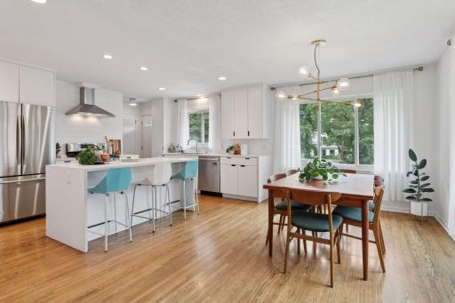Welcome to the heart of Saint Anthony Park, at 2420 Como Avenue. Embrace privacy, airy open spaces and walkability in this midcentury brick home.
