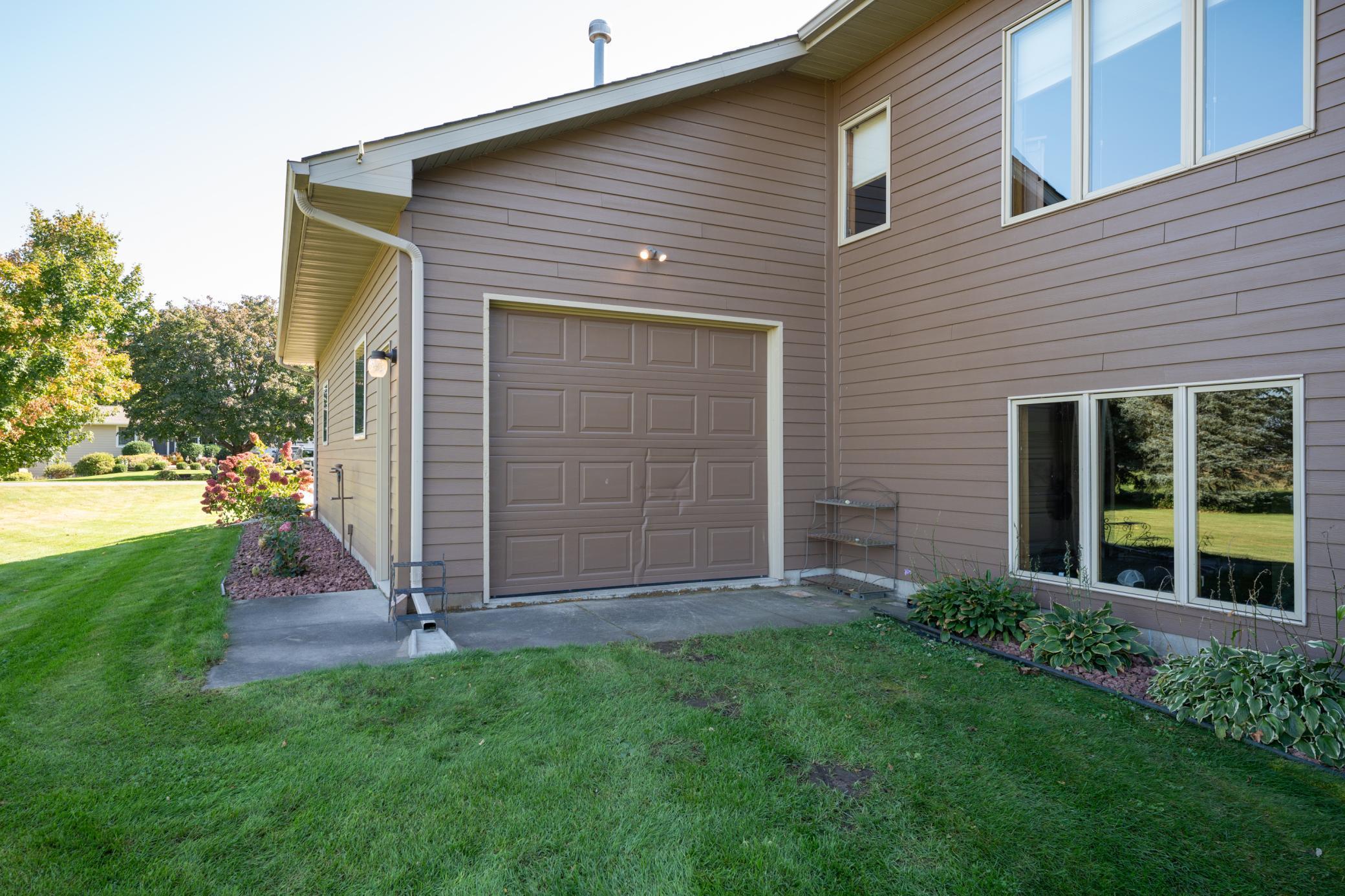 Rear overhead door that makes mowing the lawn a breeze!