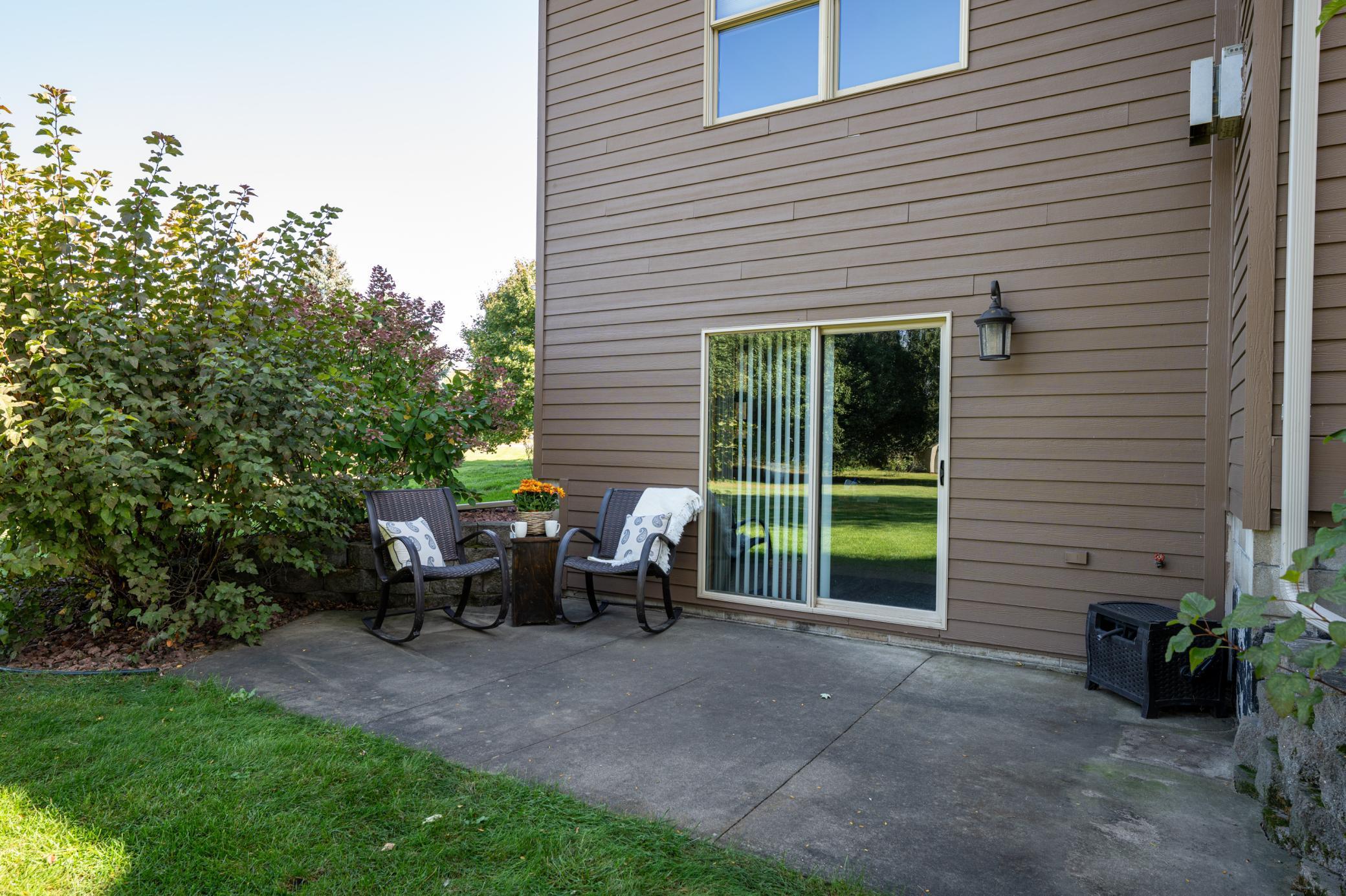 Relax and enjoy the backyard from the back patio.