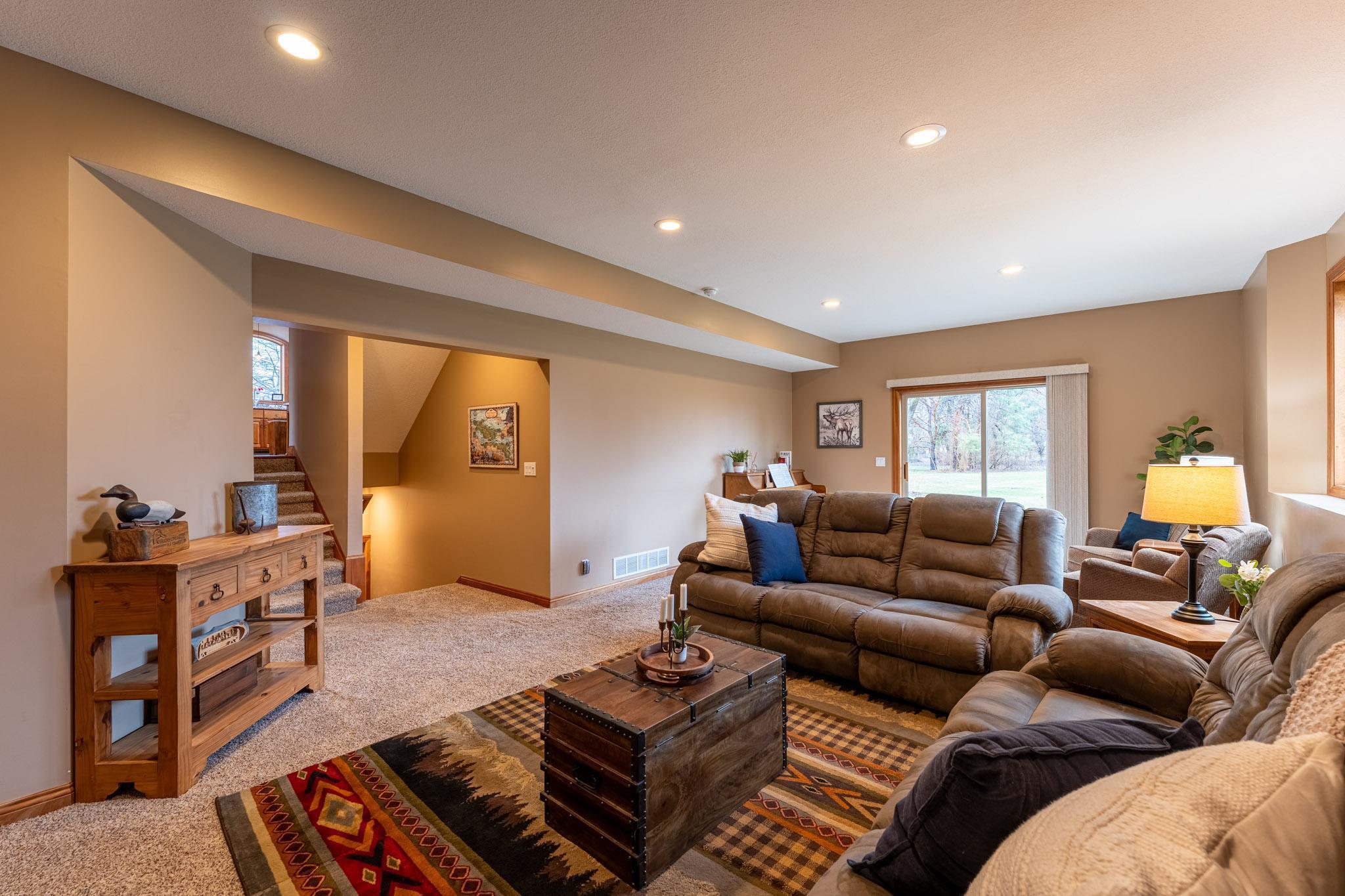 The lower level family room has sliding-door access to the back patio.