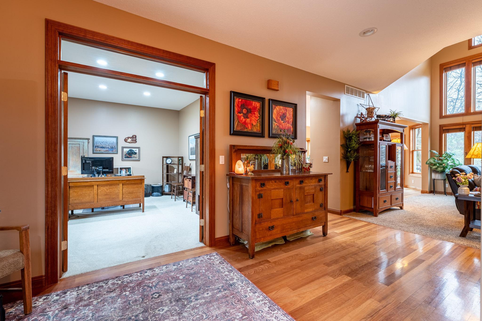 Office with French doors just off the foyer - perfect for remote work