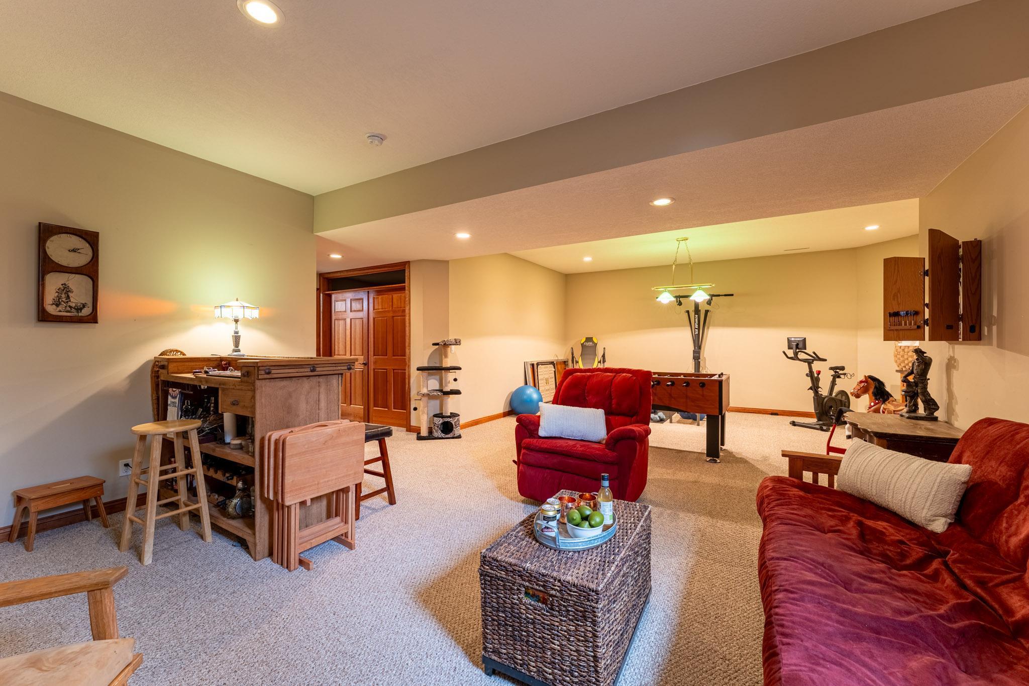 Check out this oversized 29 x 15.5 recreation room! The French doors shown are the hobby room.