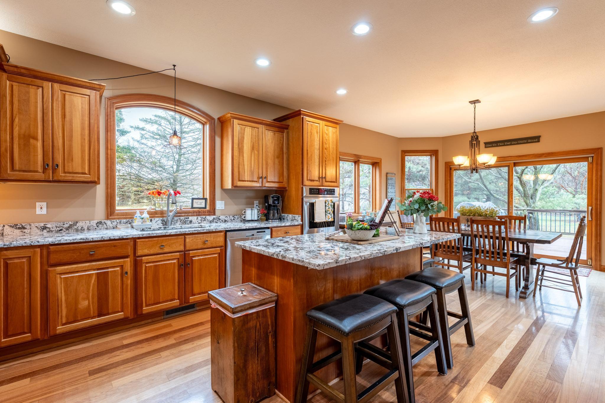 At the heart of the home, the bright custom kitchen!