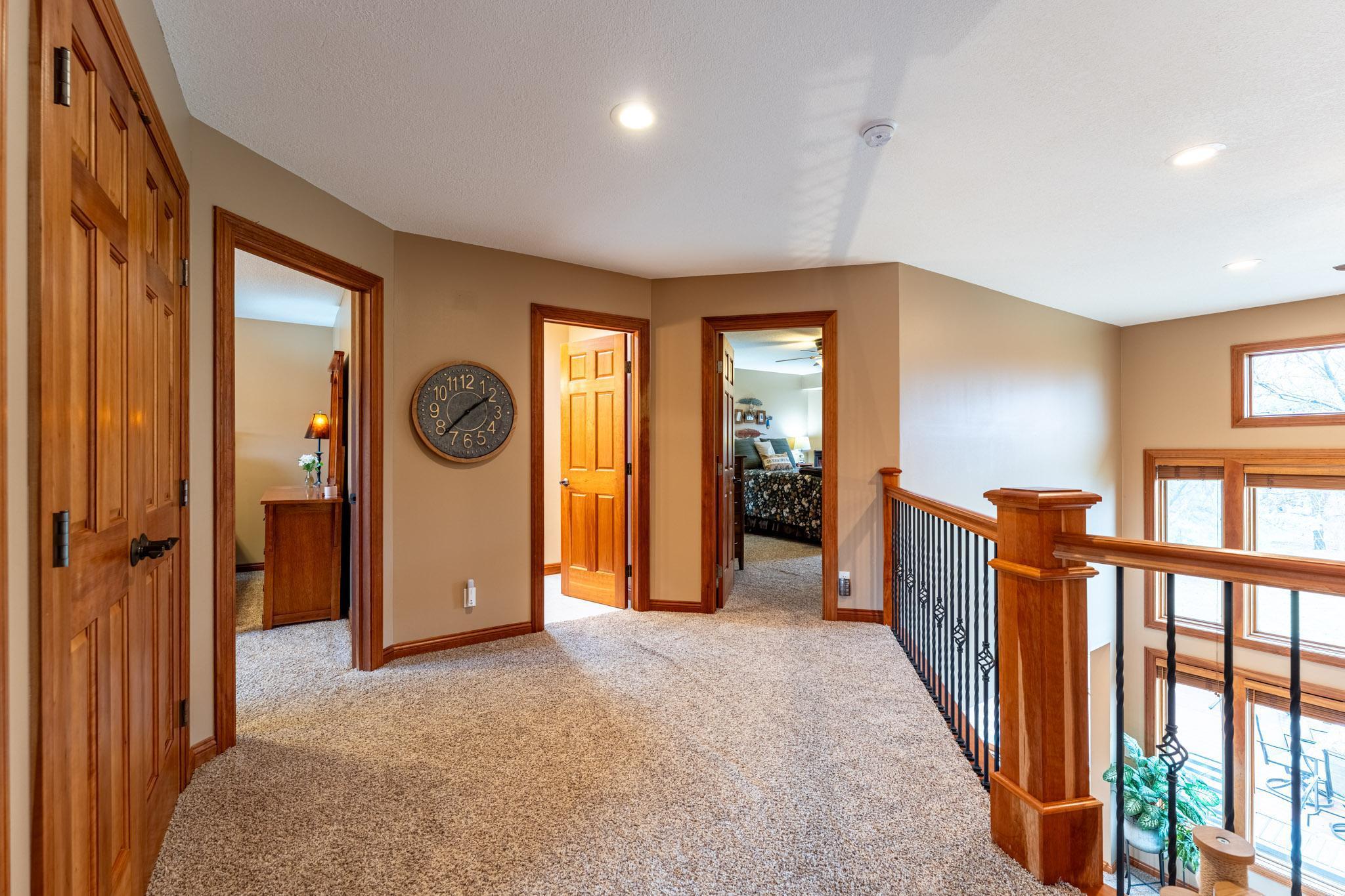 The top-level has three additional bedrooms and a full bath.