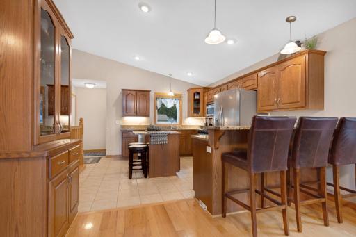 Kitchen also have 2 islands for seating.