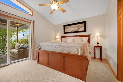 Main floor primary. This bedroom also walks out to the deck overlooking the lake!
