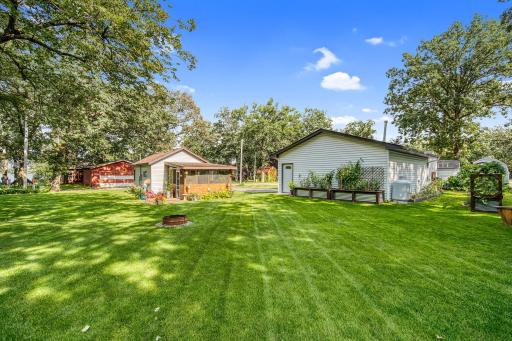 Lot across the street with the bunk house and detached garage.