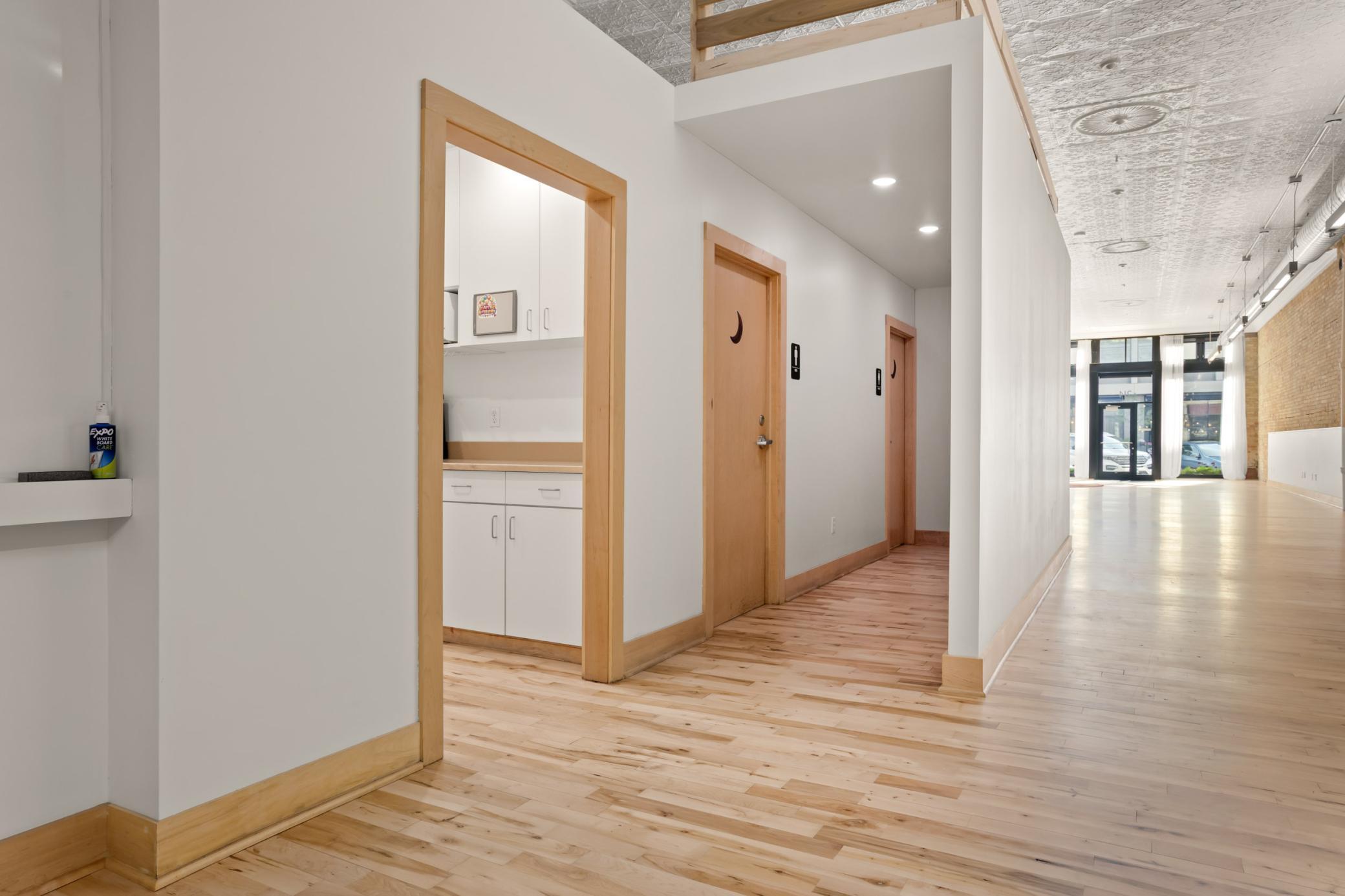 View of doorway to kitchenette and access to ADA bathrooms