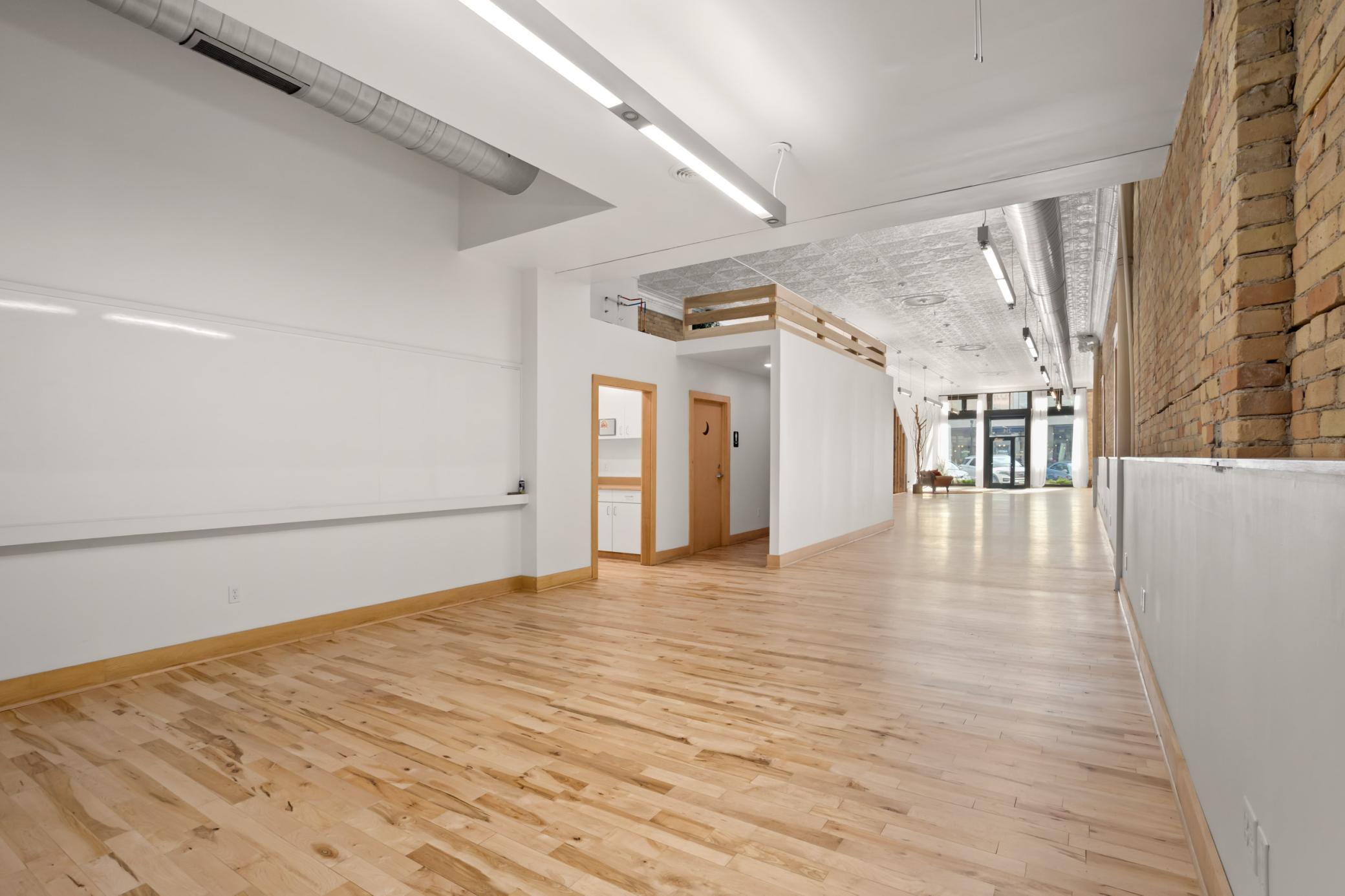 View from back of space looking toward front entrance
