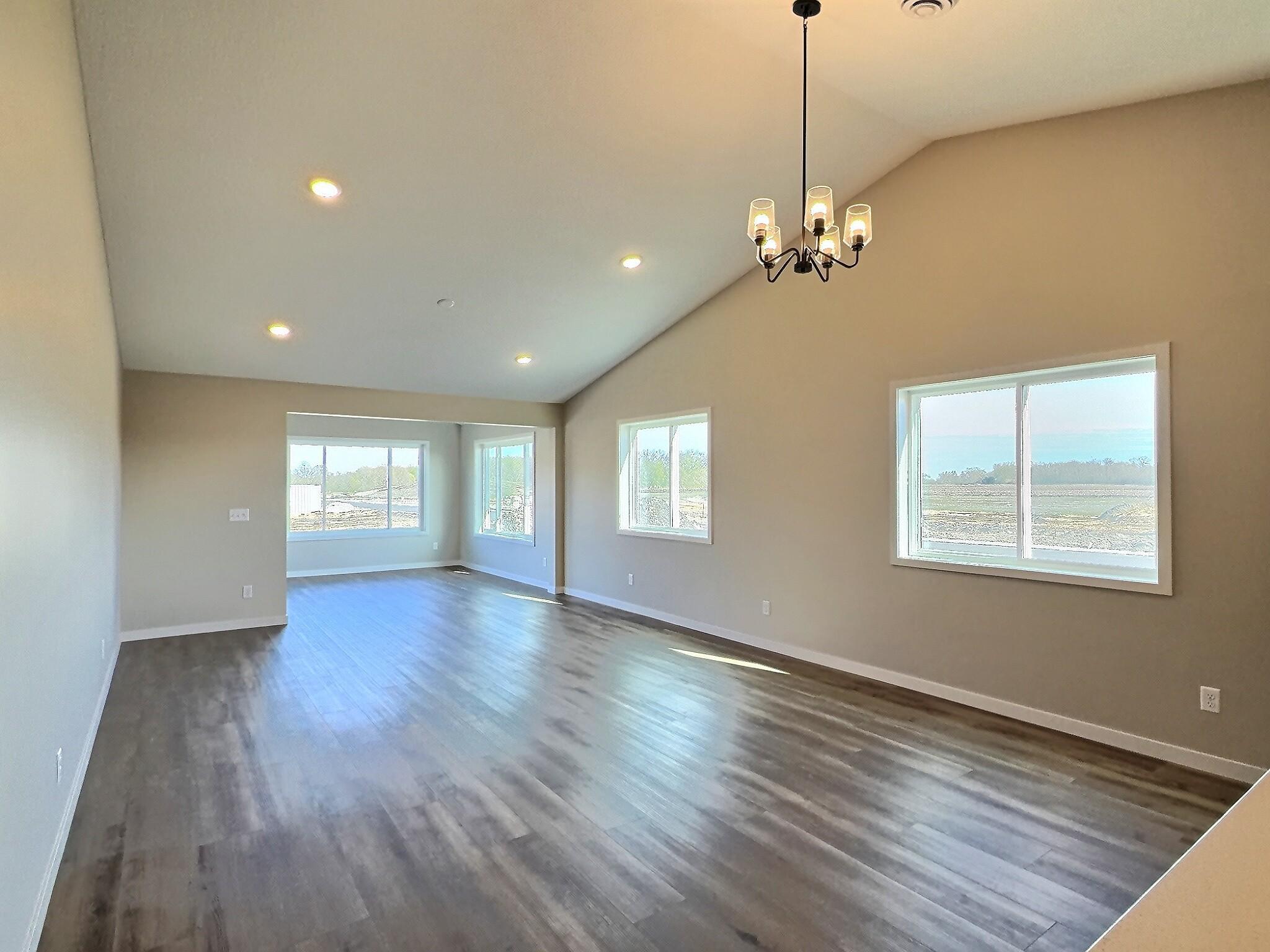 This is the kitchen living and dining room and sun room area of the home.