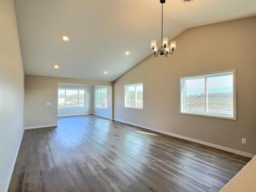 This is the kitchen living and dining room and sun room area of the home.