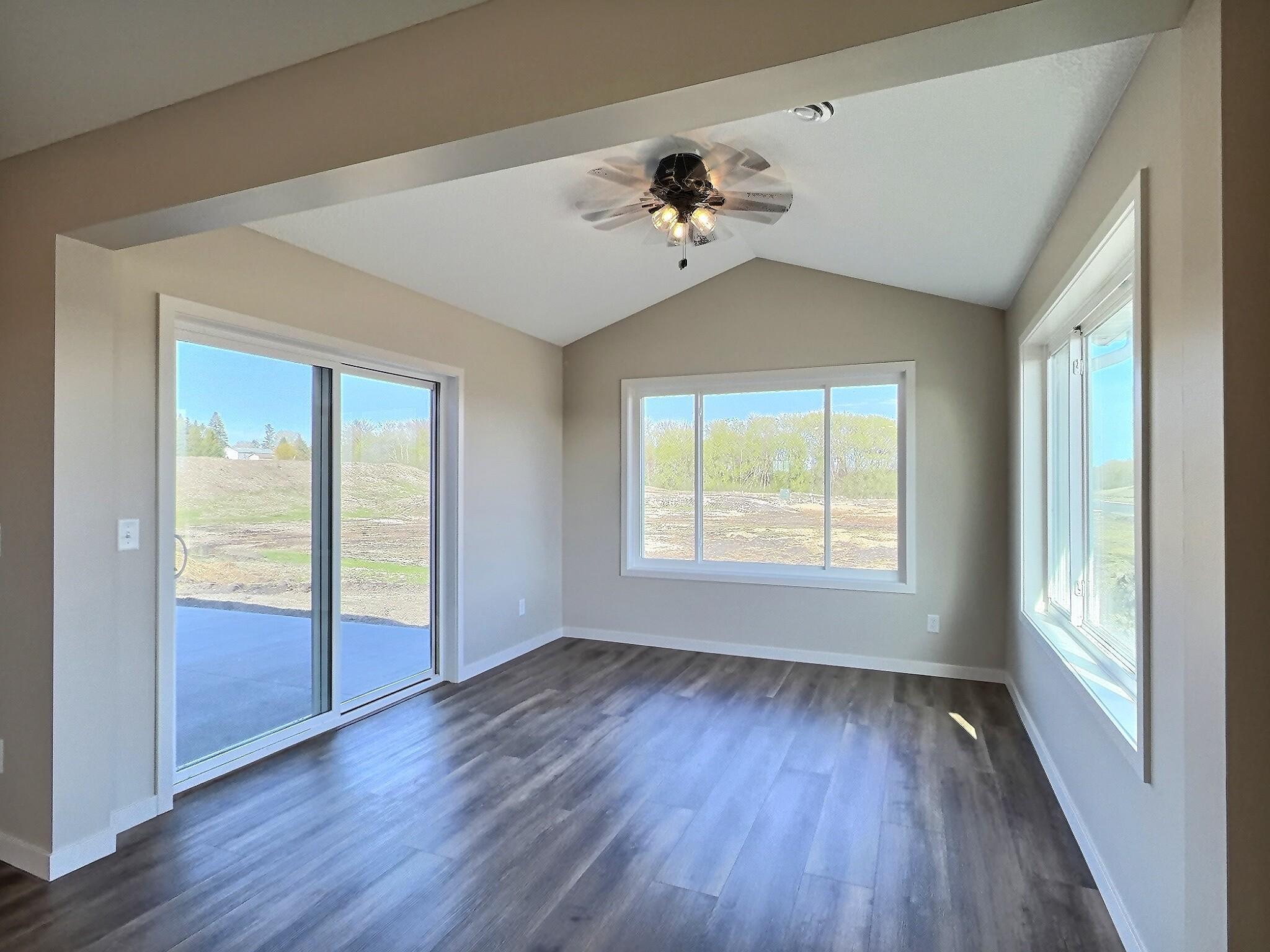 The sunroom is off the back side, and will stream with natural light. Walks out to a spacious back patio, perfect for outdoor entertaining.