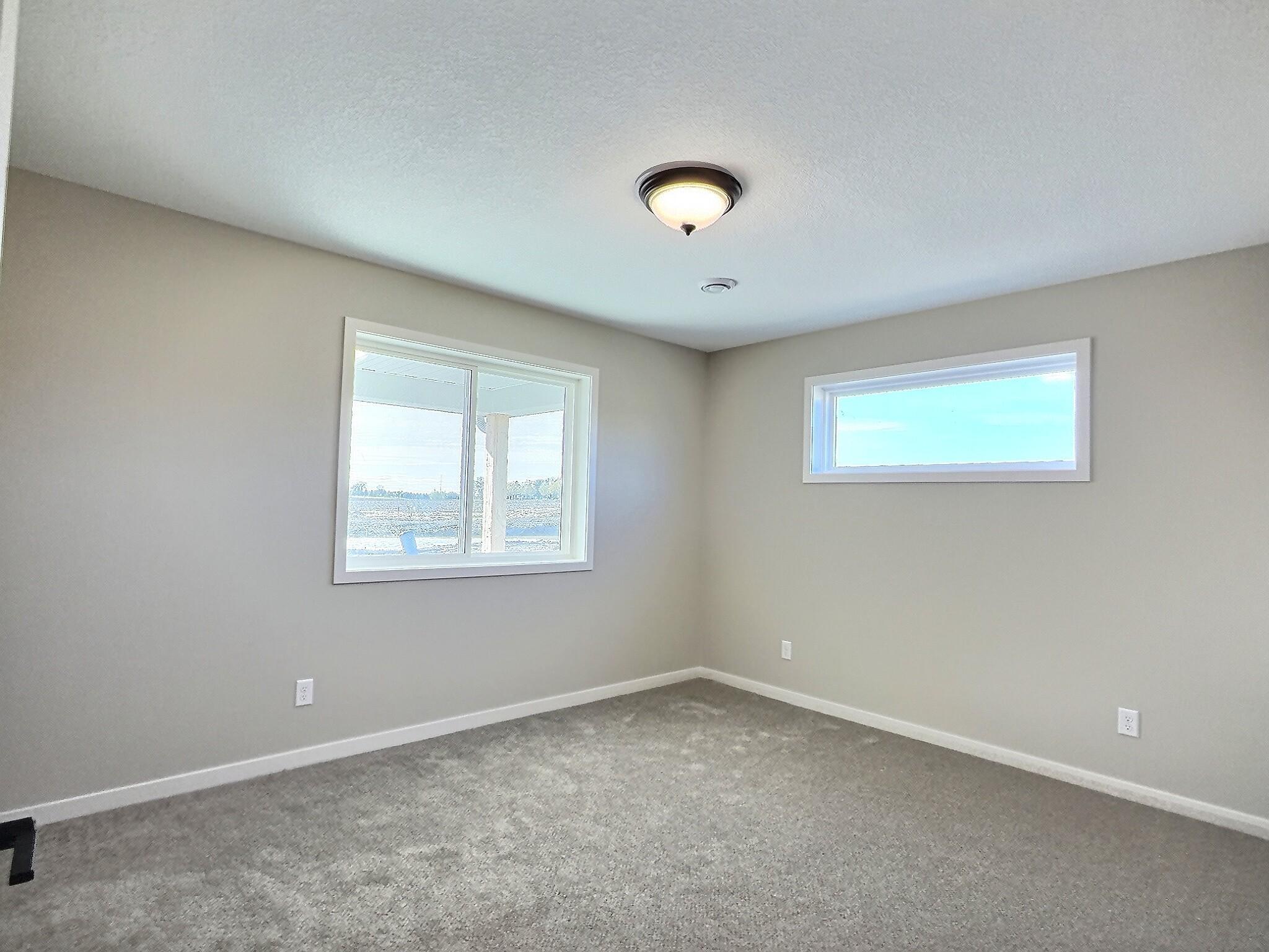 2nd bedroom that can also be used as a home office and located on the front side of the home.