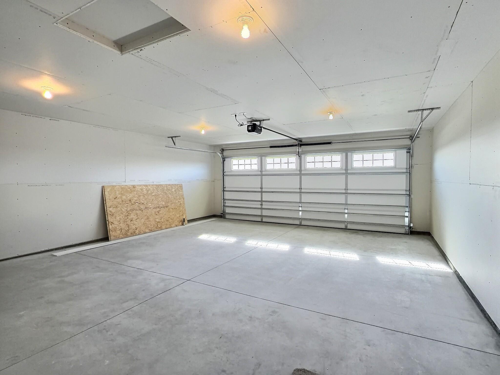 The interior of the garage is insulated and sheet rocked and this is where you access the mechanical room.