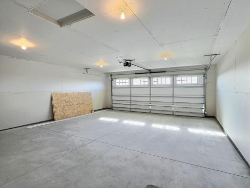 The interior of the garage is insulated and sheet rocked and this is where you access the mechanical room.