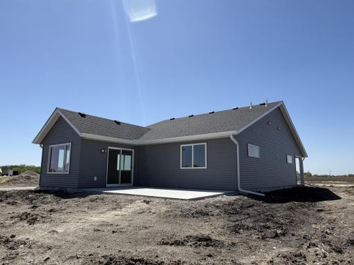 Here is the rear view of the new patio home built. There will be a spacious patio on the back side of the home to entertain on. Few outside projects left to go.