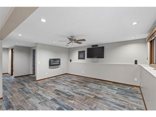Lower-level living area ideal for a media room, game room, or versatile flex space to fit your lifestyle.