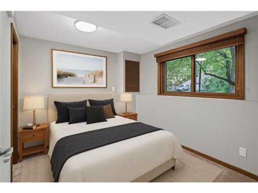 Second lower level bedroom virtually staged