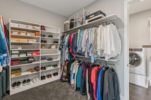Primary Bedroom Walk-through Closet to Laundry Room