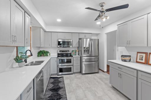 Main level: brand new kitchen/stainless appliances/LVT