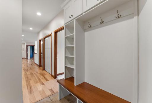 Two separate areas with built in mudroom storage