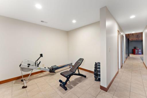 Lower level work out space has an egress window and if you add a door it could be a 5th bedroom.