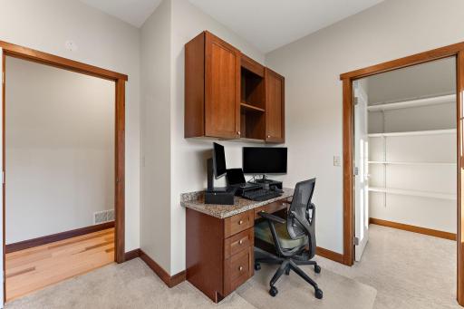 Main level office or craft room, complete with a closet and windows!