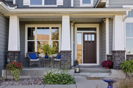 Lovely front porch area to enjoy this summer.