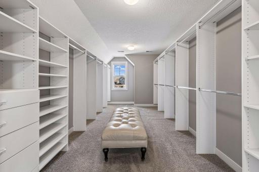 Talk about a dream closet!! The closet for the primary suite is HUGE and has a wonderful custom closet organizer.