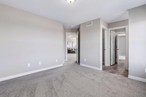 Bedroom #3 on the upper level with access to the Jack and Jill bathroom.