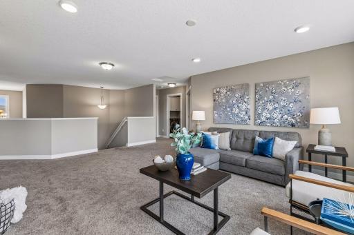 Primary suite, laundry room and bedroom #2 to the right.