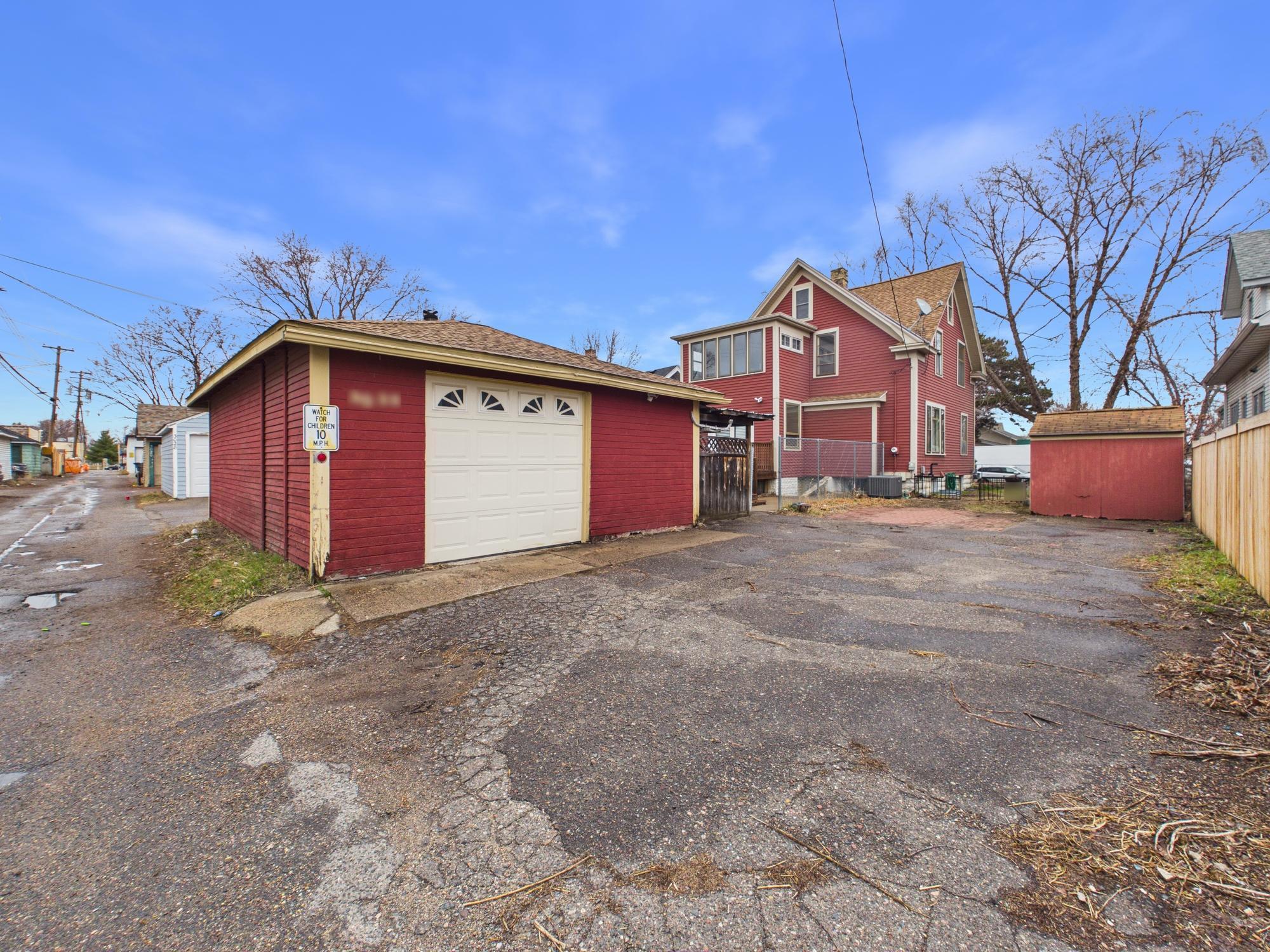 Driveway, garage, and storage shed at rear of home - 3032 Longfellow Ave., Minneapolis