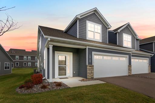 One-level living at its finest! This 2022 end-unit features a main-floor owner’s suite, gourmet kitchen, and electric fireplace. The upper level adds a loft, bedroom, and full bath. Highlights: private patio, epoxy garage floor, and new microwave.