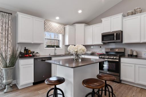 Photo for 10855 Hemingway Avenue S, Cottage Grove, MN 55016 - listing #6803695 (Photo of decorated model, actual home's finishes will vary) This new two-story home showcases a modern design with a lower-level recreation room for versatility.