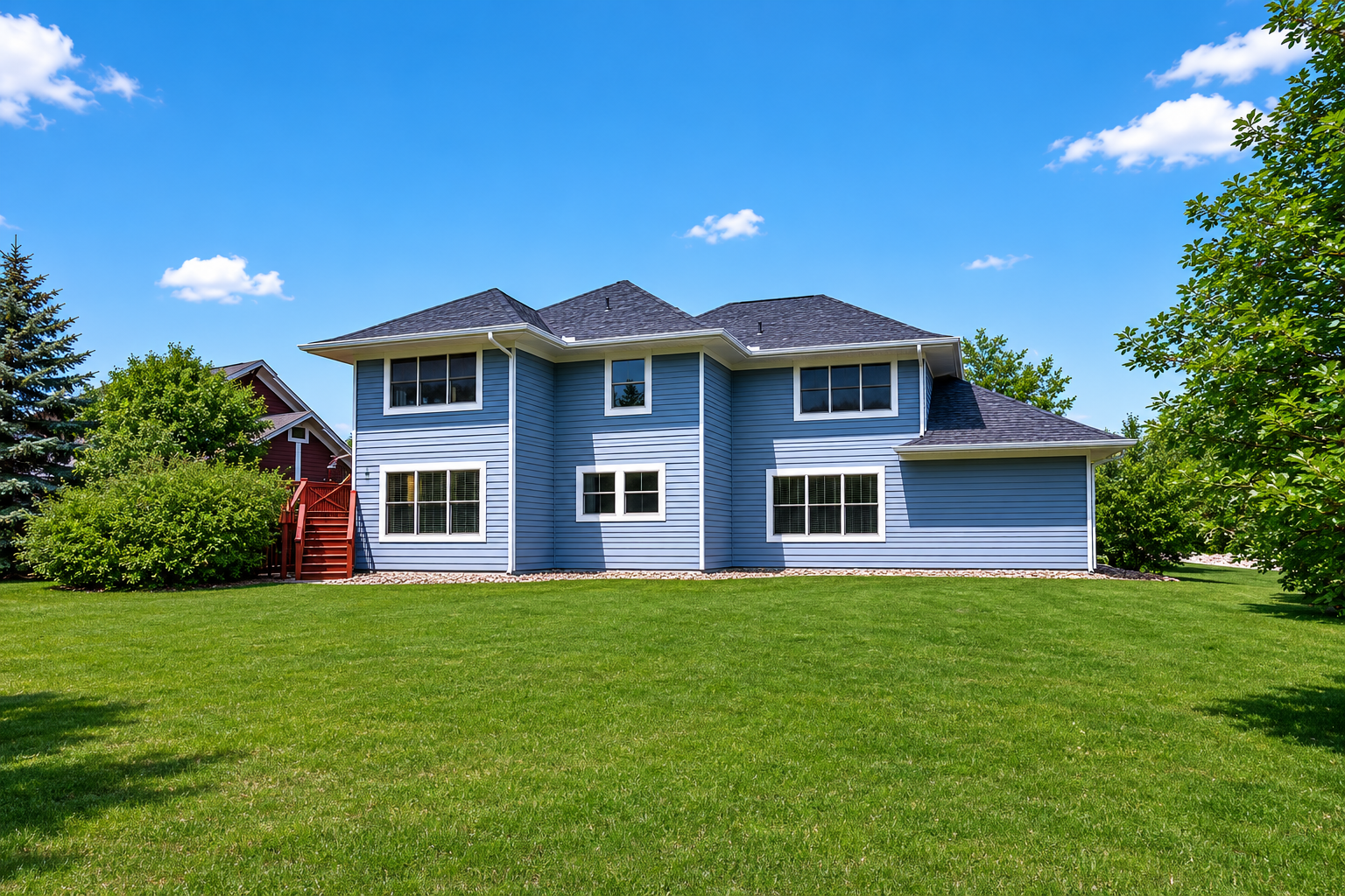 Back of house digitally altered to show what it would look like without bushes near the house.PNG