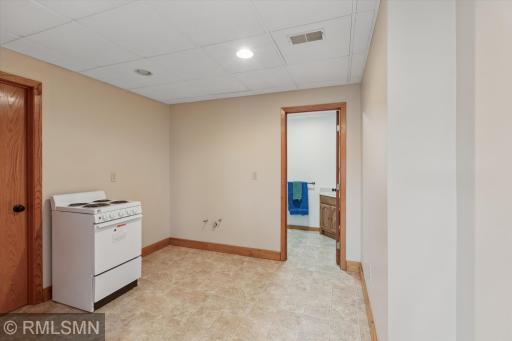 This space is set up for a kitchenette area or you could have a wet bar - ideas are endless!