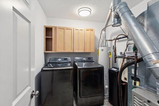 Laundry Utility Room with storage cabinets