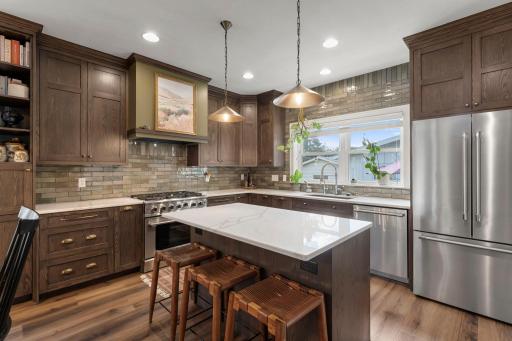 The kitchen is a true standout in this home, having undergone a full custom renovation in February 2025.