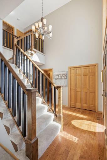 The light filled, two story foyer welcomes you to the home.
