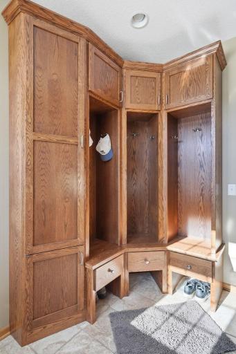 Built in lockers for storage helps organize the space and allows a spot to tuck away the mess when company comes.