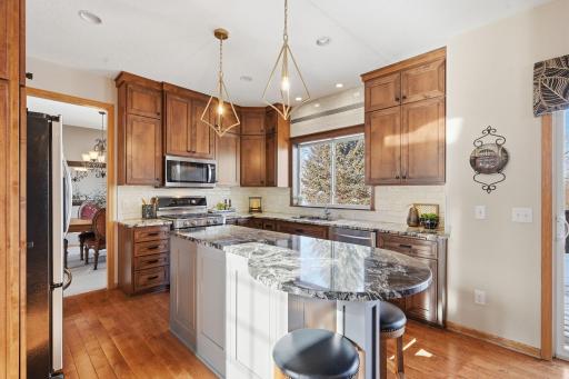The center of the home is the updated kitchen with spacious center island.
