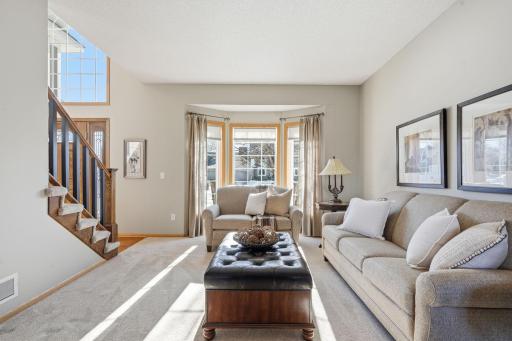 One of two family room spaces with newer carpet.