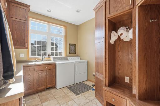 The mud/laundry room addition creates a great drop spot, right off the garage, for all your seasonal gear.